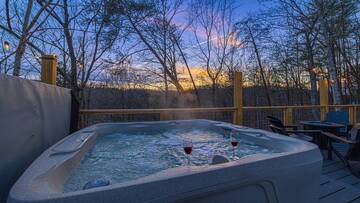 Sunset view from your Smokies hot tub. at Mountain Whispers in Gatlinburg TN