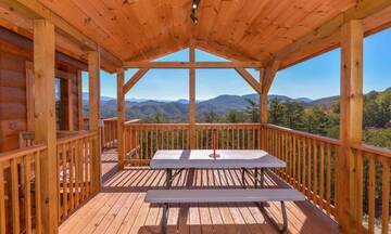 Enjoy a family picnic from your rental cabin's porch. at Mother's Dream in Gatlinburg TN