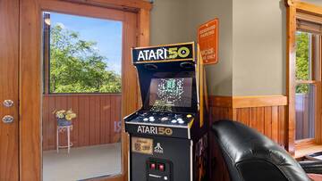 Atari mult-game arcade in the cabin's downstairs gameroom. at Moonlight Pines Lodge in Gatlinburg TN