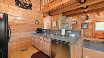 Fully equipped kitchen at your Smoky Mountains cabin. at Moonlight Pines Lodge in Gatlinburg TN