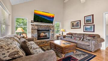 Your Gatlinburg cabin's cozy living room.with fireplace. at Bear Crossing in Gatlinburg TN