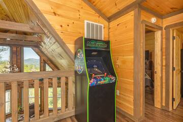 Your cabin video arcade is sure to bring smiles to some family members. at The Appalachian in Gatlinburg TN