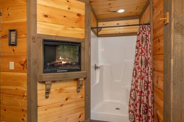 Find added warmth with the master bath's fireplace. at The Appalachian in Gatlinburg TN
