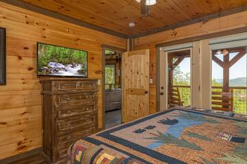 Enjoy  Smoky Mountain views and television from your master bedroom. at The Appalachian in Gatlinburg TN