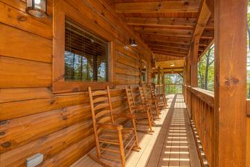 Your rental cabin has plenty of rockers for relaxing in the shade. at The Appalachian in Gatlinburg TN