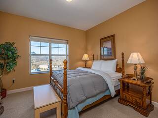 Pigeon Forge condo's 1st bedroom with king bed.