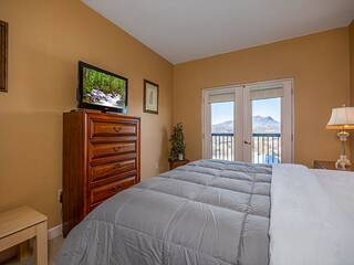Pigeon Forge condo's 2nd bedroom with TV.
