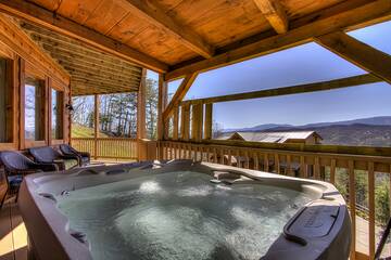 Hot tub cabin in the Smoky Mountains with views.