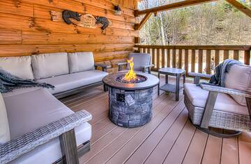Covered gas fire pit at Smoky Mountains rental cabin. at A Point of View in Gatlinburg TN